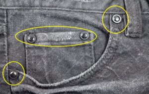 چرا هر شلوار‌ جین ۶ دکمه فلزی کوچک دارد؟