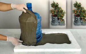 طرز درست کردن آکواریوم و گلدان با کمک بطری پلاستیکی کهنه(+ویدئو)